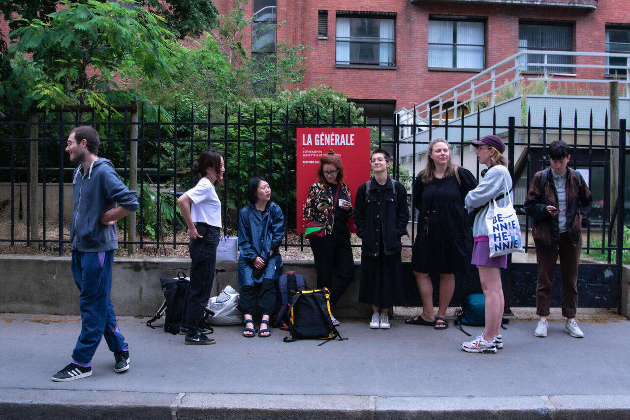 us waiting in front of 'la general' to enter