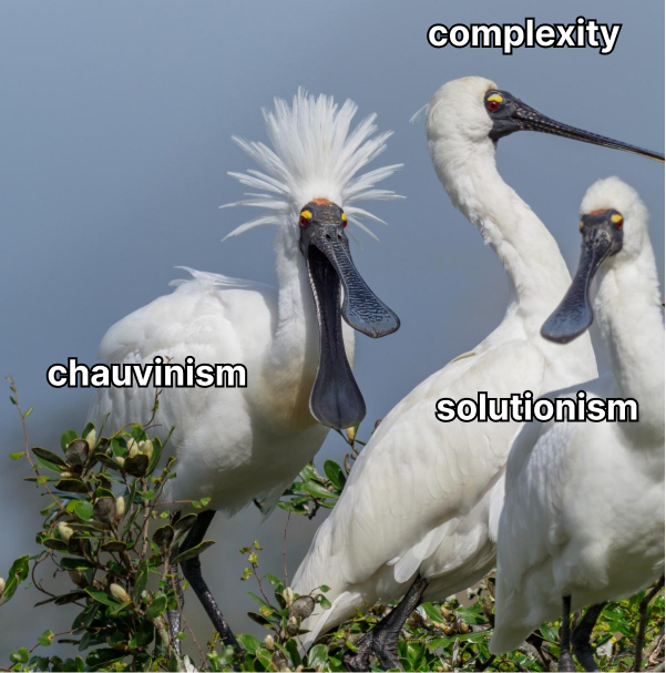 three spoonbills